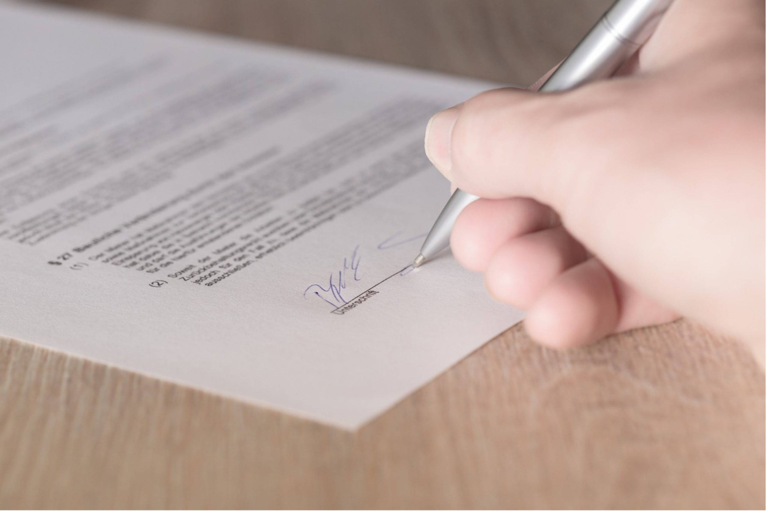 Business Owner Signing a Contract