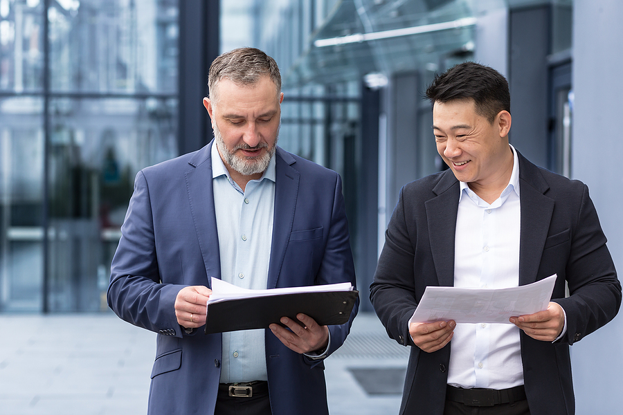 Two lawyers looking over business documents together