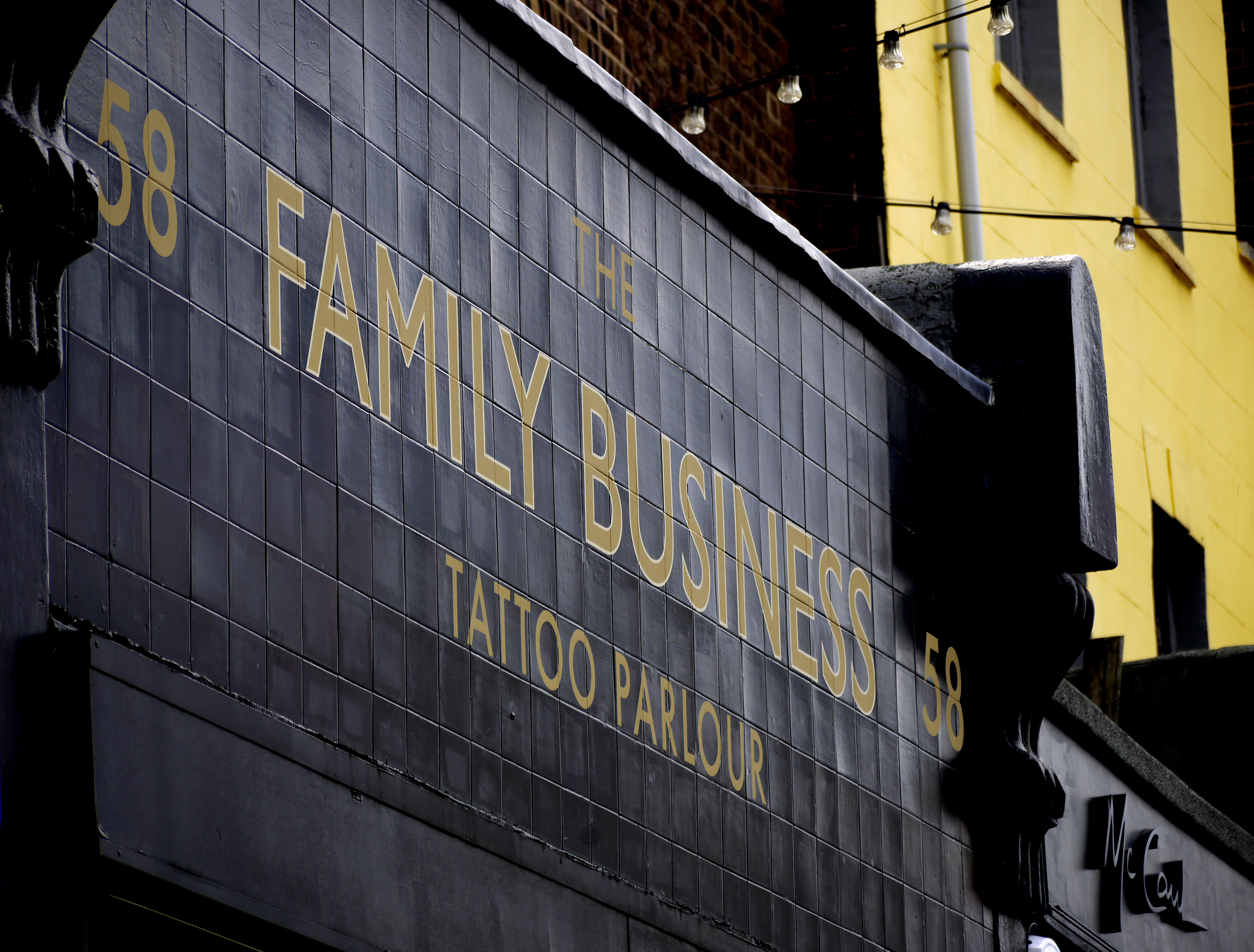 Signage of a family tattoo business